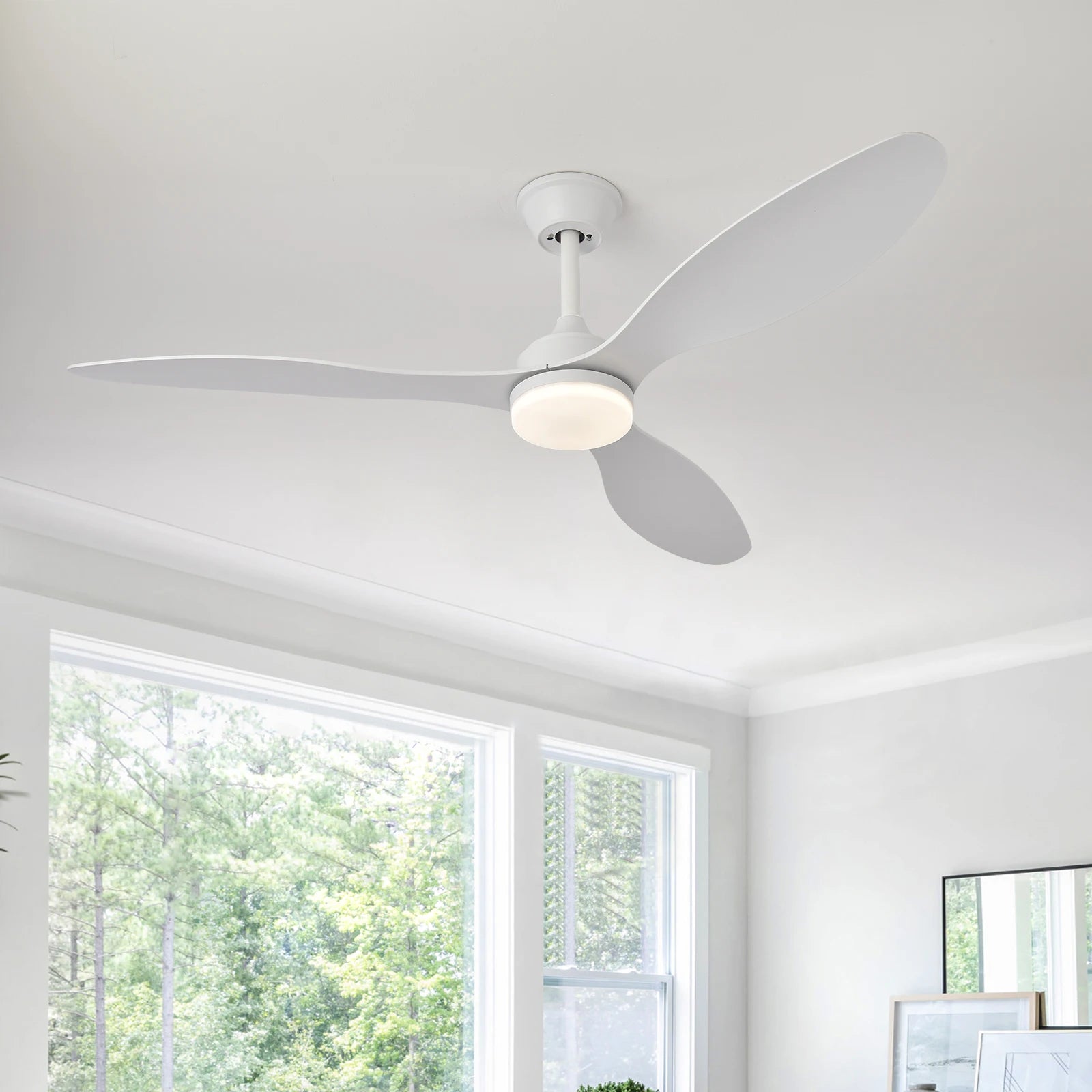 Low-profile white ceiling fan with three sleek blades and integrated circular light fixture with remote control